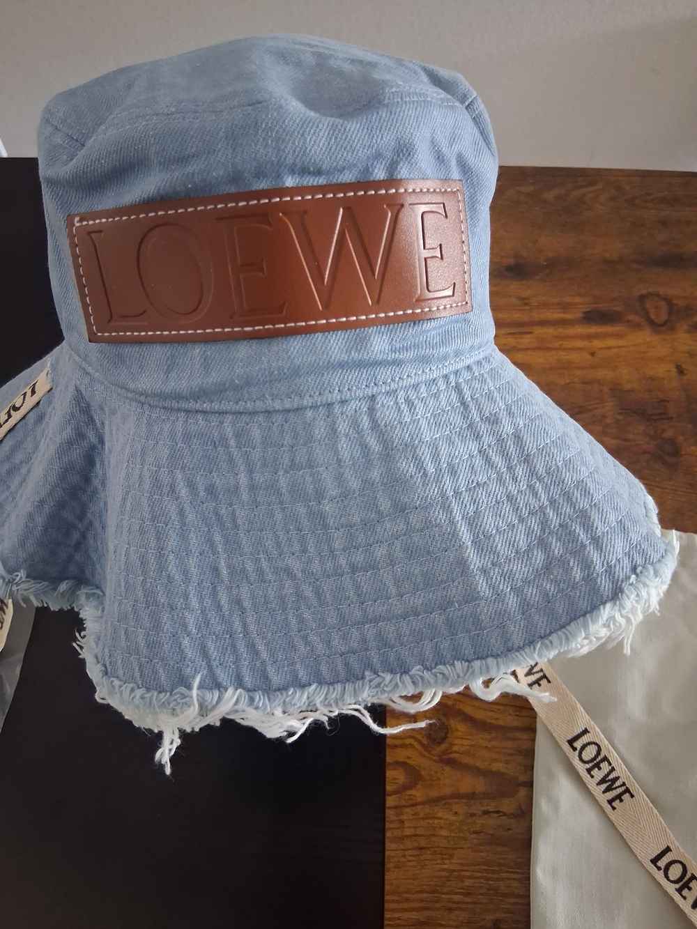 Loewe Light Blue Denim Frayed Brim Bucket Hat with Brown Leather Patch